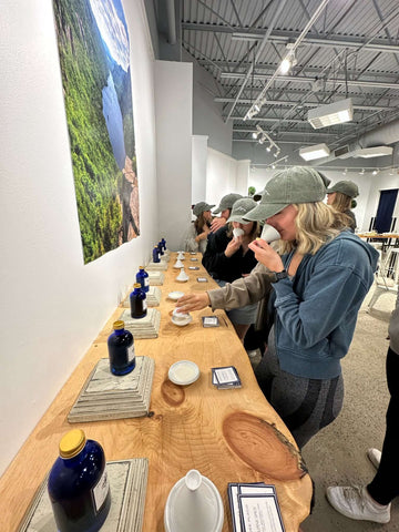 women testing scents at Pure Placid Candle Bar
